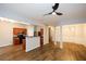 Open floorplan view of living room, kitchen, and dining area with wood floors at 1905 Granville Dr, Lawrenceville, GA 30043