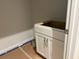 Walk-in closet with built-in shelves and white cabinets offering ample storage space at 30 Riverrock Trl, Dallas, GA 30157