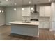 Spacious kitchen with modern appliances and a large center island, perfect for cooking at 30 Riverrock Trl, Dallas, GA 30157