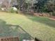 Spacious backyard with lush grass, providing ample room for outdoor enjoyment at 4691 Bo Hendrick Dr, Austell, GA 30106