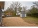 Backyard with shed for extra storage, offering a practical and tidy outdoor space at 4691 Bo Hendrick Dr, Austell, GA 30106