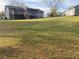Expansive backyard with a gentle slope, ideal for recreation and gardening at 4691 Bo Hendrick Dr, Austell, GA 30106