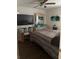 Spacious bedroom with wood floors, a large television, and ample storage space at 4691 Bo Hendrick Dr, Austell, GA 30106