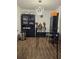 Dining area features dark accents, hardwood flooring, and ample natural light at 4691 Bo Hendrick Dr, Austell, GA 30106