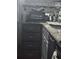 Kitchen with granite countertops and gray cabinets at 4691 Bo Hendrick Dr, Austell, GA 30106