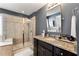 Bathroom featuring a glass shower and vanity with a granite countertop at 4852 Merriman Se Walk # 23, Atlanta, GA 30339