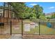 Community dog park with secure fencing and signage, providing a safe space for pets at 4852 Merriman Se Walk # 23, Atlanta, GA 30339