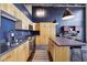 Updated kitchen with stainless steel appliances, island and modern countertops at 5200 Peachtree Rd # 1111, Atlanta, GA 30341