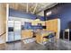 Modern kitchen features stainless steel appliances, island, and sleek cabinetry at 5200 Peachtree Rd # 1111, Atlanta, GA 30341
