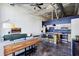 Spacious area with modern appliances, high ceilings, island, and large windows at 5200 Peachtree Rd # 1111, Atlanta, GA 30341