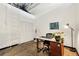 Bright office with a modern desk, polished concrete floors, and storage for an efficient workspace at 5200 Peachtree Rd # 1111, Atlanta, GA 30341