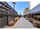 Apartment walkway with modern railings and landscaping at 5200 Peachtree Rd # 1111, Atlanta, GA 30341