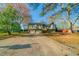 Charming two-story home with a spacious driveway and attached two-car garage at 895 Tyrell Dr, Austell, GA 30106