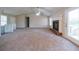 Bright living room with a brick fireplace and door to a deck at 895 Tyrell Dr, Austell, GA 30106