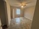 Cozy bedroom is a blank canvas ready for new flooring and personalized touches at 1430 Country Lane Ne Dr, Conyers, GA 30012