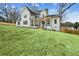 Beautiful two-story home with a well-manicured lawn and inviting front porch at 1967 Nash Se Ave, Atlanta, GA 30316