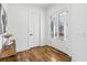 Bright foyer with hardwood floors, white walls and a wooden console table at 1967 Nash Se Ave, Atlanta, GA 30316