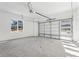 Spacious two-car garage with high ceilings, natural light, and ample room for storage and vehicles at 1967 Nash Se Ave, Atlanta, GA 30316