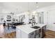 Kitchen offers island with sink, dining table, and open layout to a spacious living room at 1967 Nash Se Ave, Atlanta, GA 30316