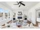 Living room with a modern fireplace, stylish decor, and bright natural light at 1967 Nash Se Ave, Atlanta, GA 30316