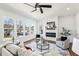 Bright living room featuring a fireplace, large windows, and modern furniture at 1967 Nash Se Ave, Atlanta, GA 30316