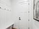 Bright mudroom features hooks, a bench, and convenient access to the home's interior at 1967 Nash Se Ave, Atlanta, GA 30316