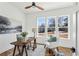 Well-lit home office space with hardwood floors, ceiling fan, and large windows overlooking the neighborhood at 1967 Nash Se Ave, Atlanta, GA 30316