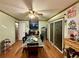 Bright dining room featuring laminate flooring, ample decor and a large window at 6079 Zachary Ct, Norcross, GA 30093
