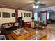 Cozy living room with multiple seating areas, area rugs, and beautiful decorations at 6079 Zachary Ct, Norcross, GA 30093