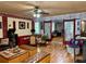 Spacious living room featuring nice decor, hardwood floors, and sliding barn doors at 6079 Zachary Ct, Norcross, GA 30093