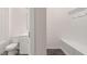 Bathroom with a toilet, sink and small coat rack bench at 13912 Homer, Covington, GA 30014