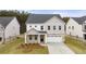 Charming two-story home with a well-manicured lawn and a two-car garage in a desirable neighborhood at 13912 Homer, Covington, GA 30014