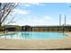 Large community pool with clear blue water and covered lounging area at 1784 Hollingsworth Nw Blvd, Atlanta, GA 30318