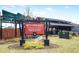 West Highlands Homeowners Association Swimming Pool Facility sign with landscaping at 1784 Hollingsworth Nw Blvd, Atlanta, GA 30318