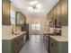 Updated kitchen with stainless steel appliances, tile backsplash, and an adjacent dining area at 1784 Hollingsworth Nw Blvd, Atlanta, GA 30318