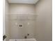 Laundry room with tile flooring and hookups at 1784 Hollingsworth Nw Blvd, Atlanta, GA 30318