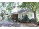 Charming single-story home with a screened-in porch and beautiful landscaping at 1908 Bouldercrest Se Rd, Atlanta, GA 30316