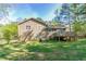 Spacious backyard with a deck, ideal for outdoor gatherings and activities at 2619 Del Ridge Dr, Douglasville, GA 30135