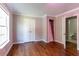 Bedroom with hardwood floors, a double closet, and bathroom access, perfect for comfortable living at 2619 Del Ridge Dr, Douglasville, GA 30135
