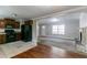 Open-concept space connects the kitchen and the living room featuring neutral paint at 2619 Del Ridge Dr, Douglasville, GA 30135