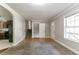 Inviting living room featuring hardwood floors, neutral walls, and a staircase leading upstairs at 2619 Del Ridge Dr, Douglasville, GA 30135