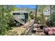Inviting backyard retreat featuring a fire pit, seating area, and a charming deck at 323 Fayetteville Rd, Decatur, GA 30030