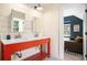 Charming bathroom featuring a modern vanity, dual oval mirrors, and shiplap wall at 323 Fayetteville Rd, Decatur, GA 30030