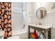 Bright bathroom features a tiled shower and unique vanity at 323 Fayetteville Rd, Decatur, GA 30030