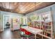 Dining room with built-in bookshelves and abundant natural light at 323 Fayetteville Rd, Decatur, GA 30030