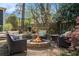 Cozy backyard fire pit area with comfortable seating, perfect for outdoor entertaining at 323 Fayetteville Rd, Decatur, GA 30030