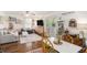 Bright, open-concept living and dining area with stylish furniture and lots of natural light at 323 Fayetteville Rd, Decatur, GA 30030