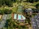 An aerial view of the neighborhood features a community pool and tennis courts at 3669 High Green Dr, Marietta, GA 30068