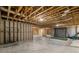 Unfinished basement with exposed beams, concrete floor, and versatile space for storage or recreation at 3669 High Green Dr, Marietta, GA 30068