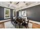 Sophisticated dining room with coffered ceilings, a large window, and elegant decor at 3669 High Green Dr, Marietta, GA 30068